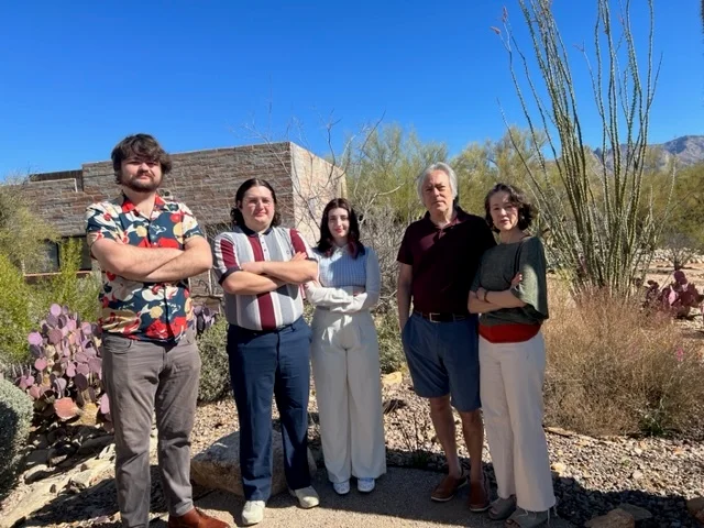 The MedQuest team posing for a photo at a retreat.